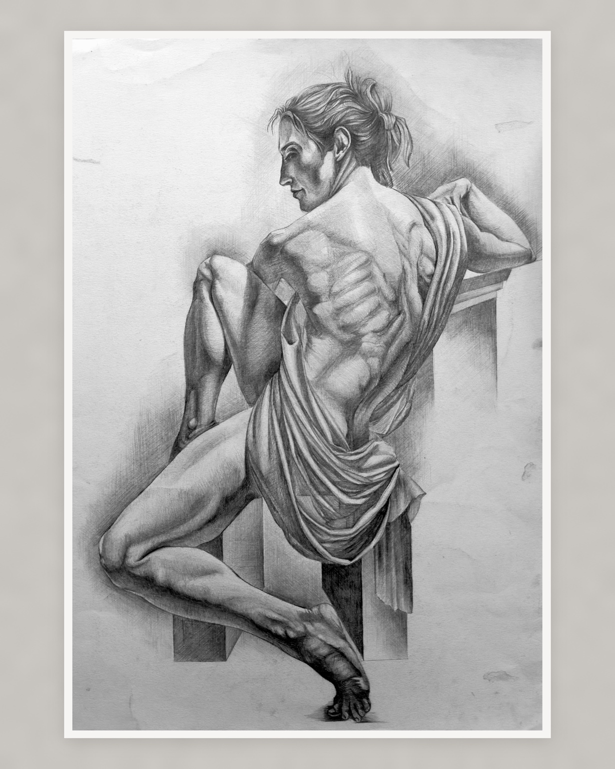 Graphite anatomical study of a seated figure viewed from behind